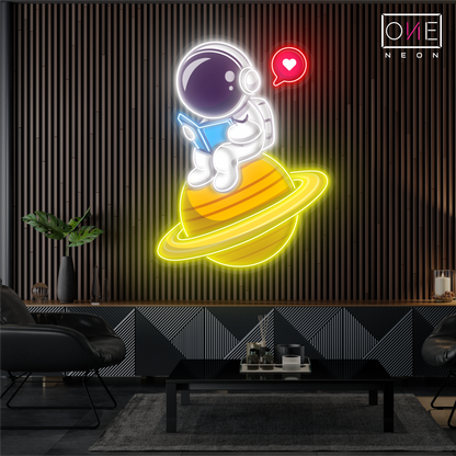 Enseigne néon LED artistique astronaute mignon en train de lire