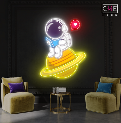 Enseigne néon LED artistique astronaute mignon en train de lire